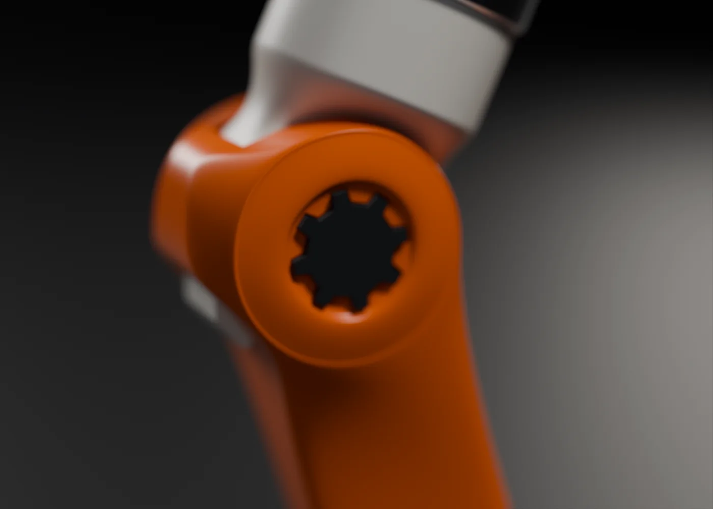 Close-up of the joint with the side cap removed, showing the eight-lobed TPU core keyed into the body.