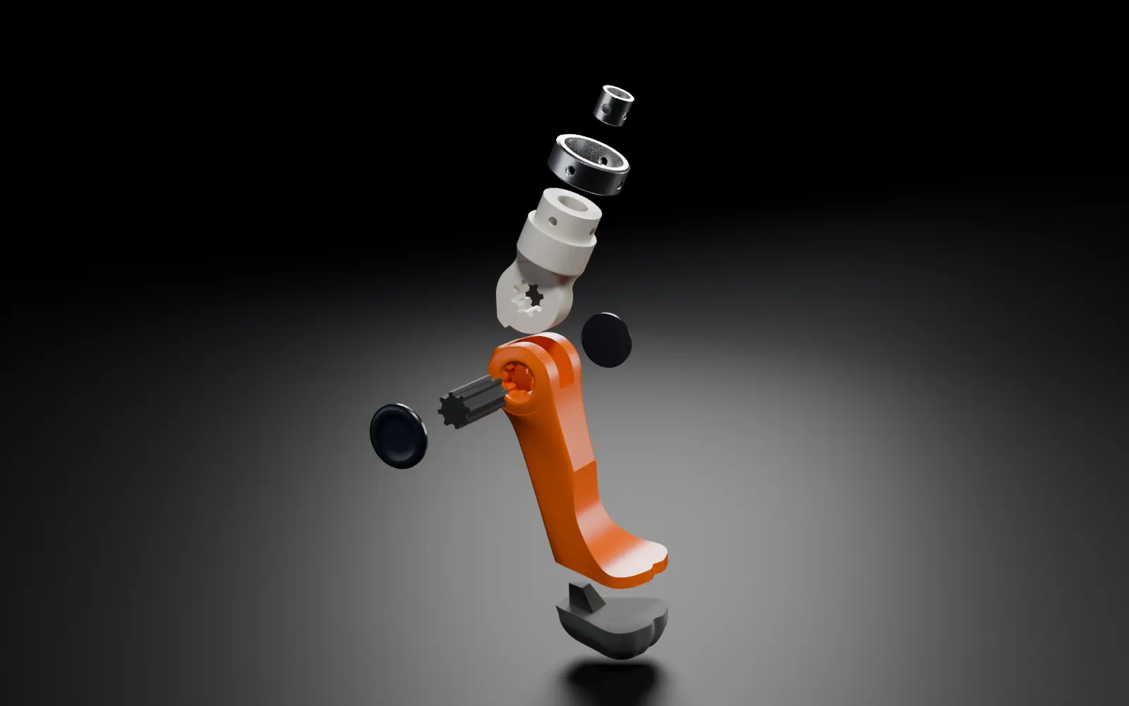 The paw separated into its parts: steel bushings, upper interface, side caps, splined core, body and sole.