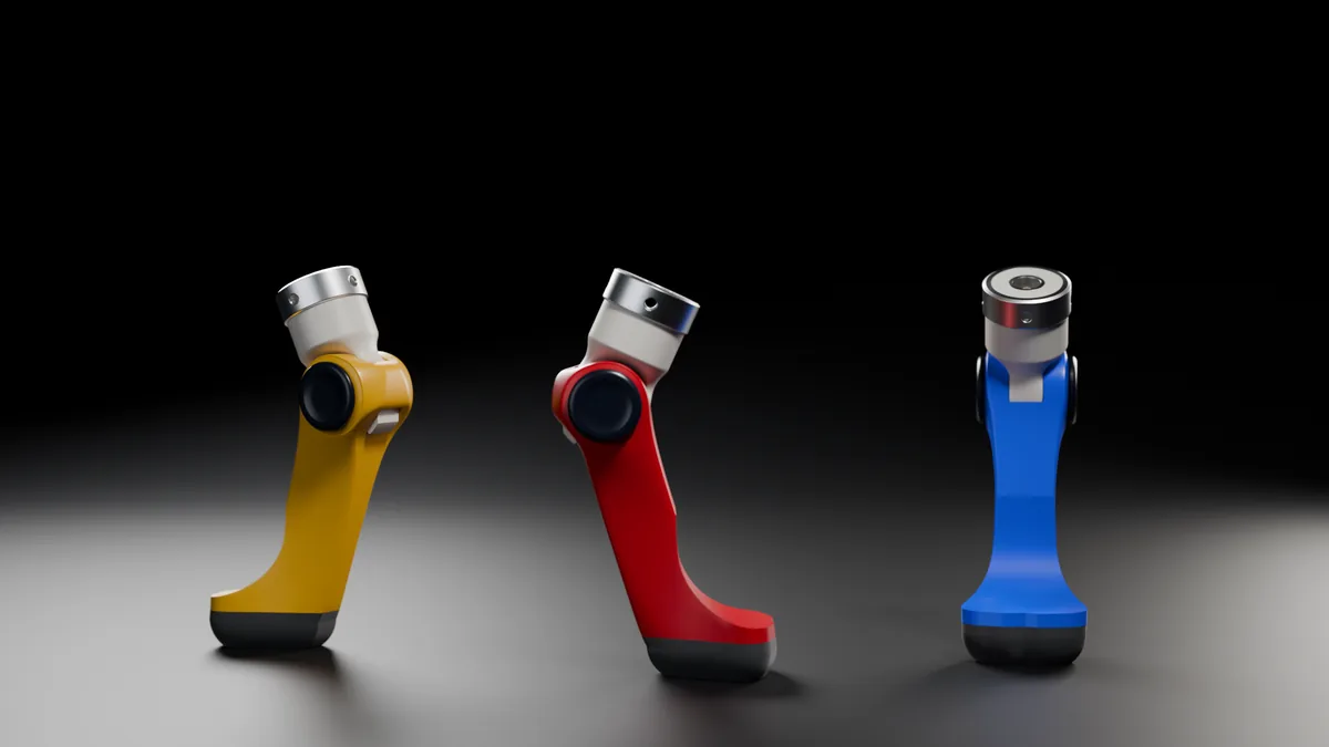 Three articulated tibial paws in gold, red and blue.